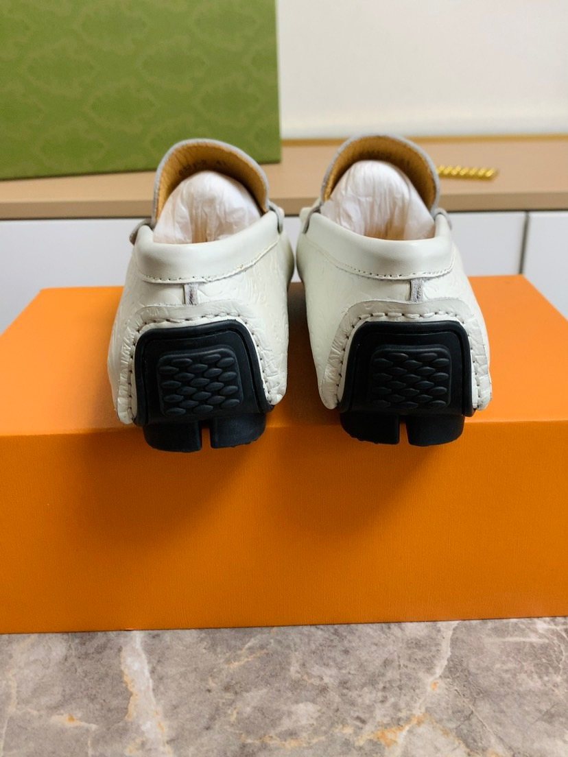 Louis Vuitton Men's White Leather Moc-Toe Loafers
